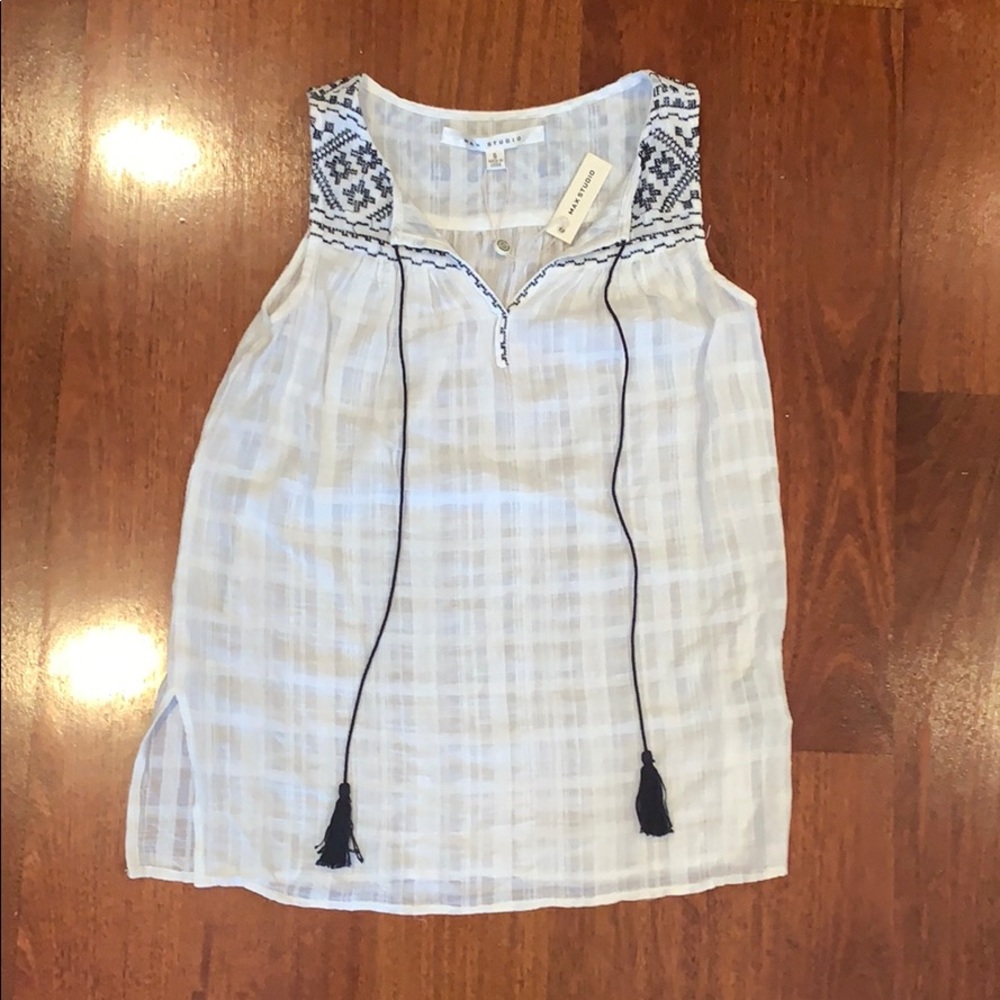 White linen top with dark blue detail